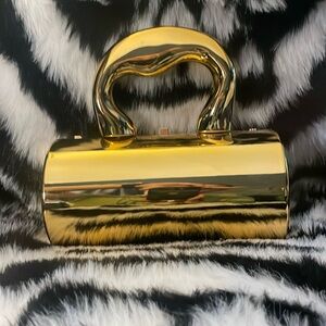 Mirrored gold handbag with gold crossbody chain